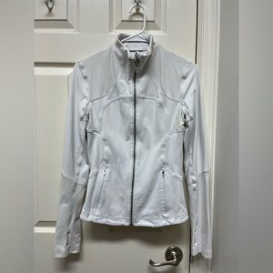 Lululemon define size 4. Used but still lots of life in it